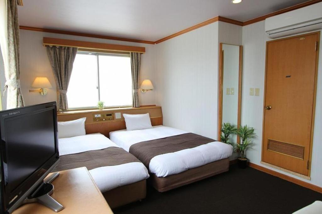 Hotel Livemax Budget Naha Tomarikou Bagian luar foto