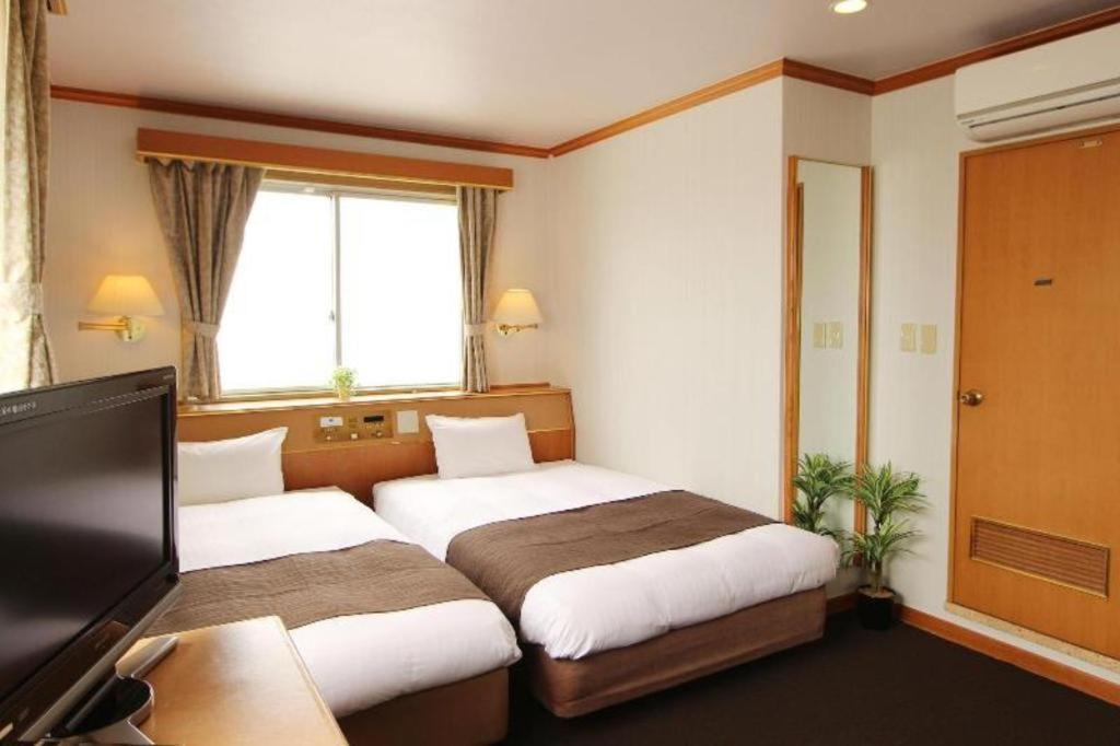 Hotel Livemax Budget Naha Tomarikou Bagian luar foto