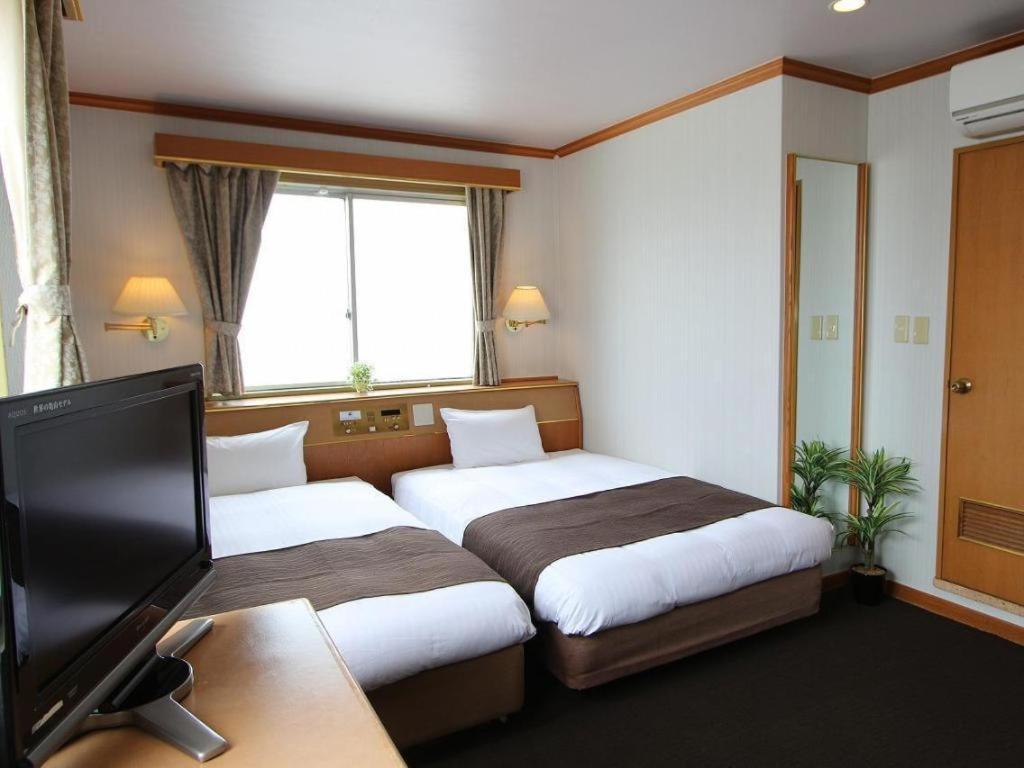 Hotel Livemax Budget Naha Tomarikou Bagian luar foto